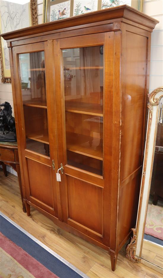 A pair of French federal-style cherrywood glazed bookcases W.122cm